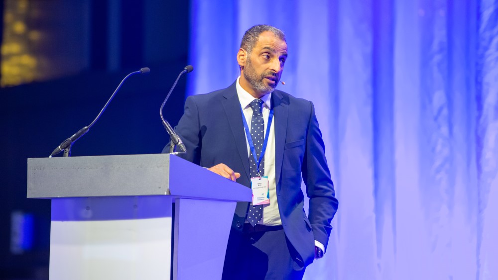 Photo shows Abbey Mulla speaking at the Integrating Innovation conference